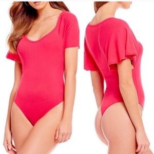 Free People new Byron Flutter Short Sleeves Bodysuit scoop neck LARGE pink chic